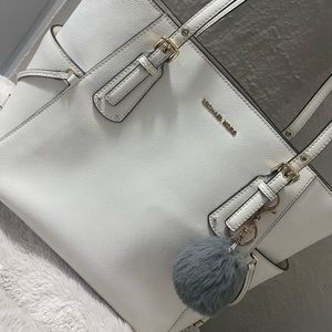 White and gold Micheal kors purse